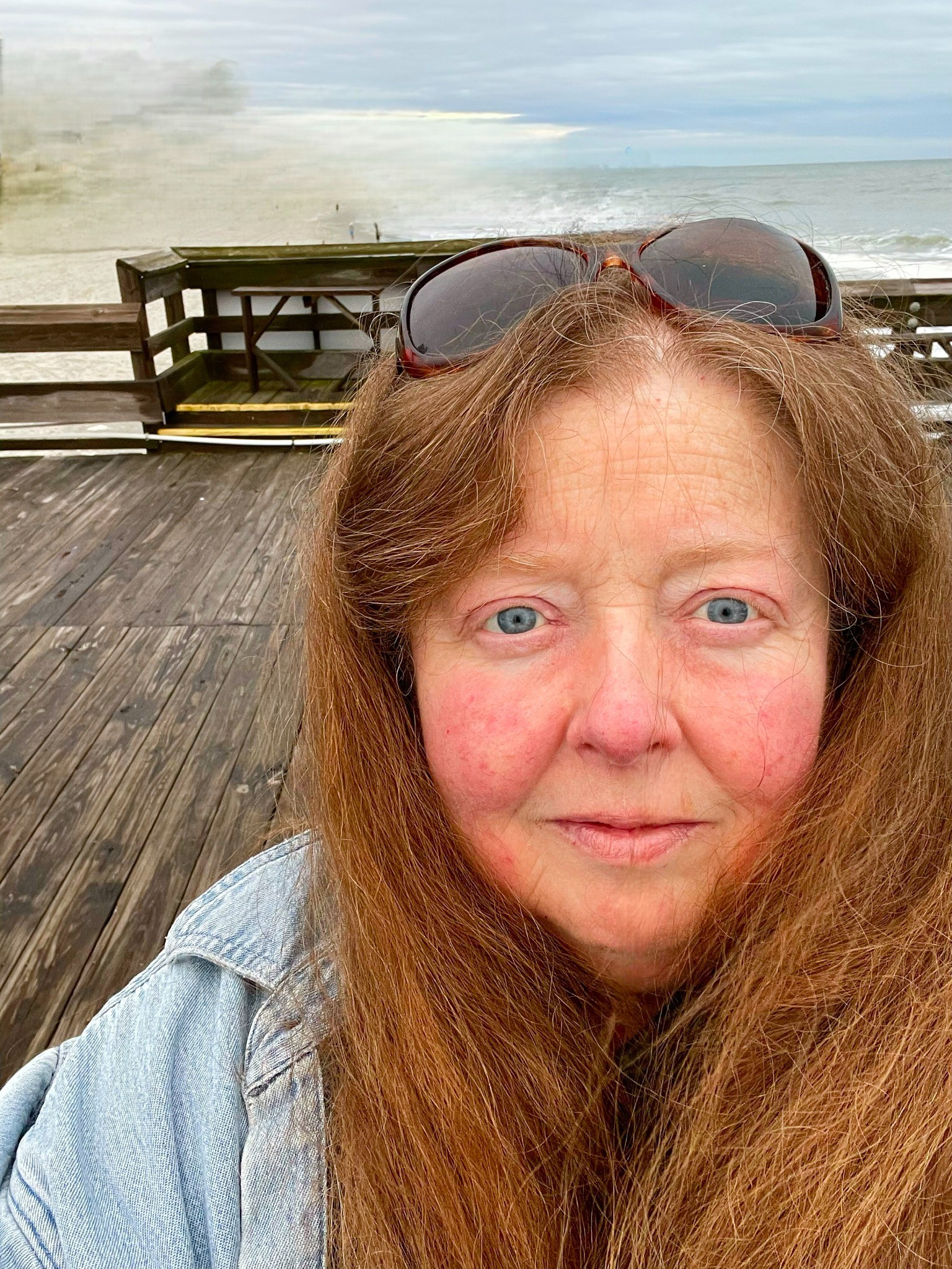 Alicia Corbin on an oceanfront boardwalk